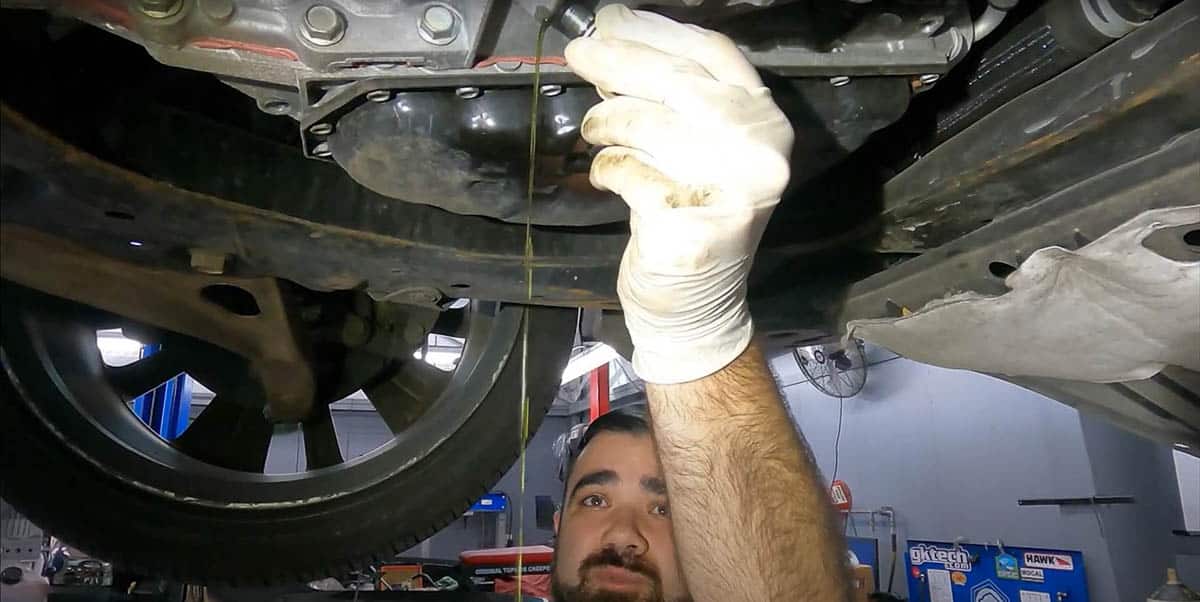 Tommy noting thinner CVT fluid drainage demonstrating the correction of fluid level