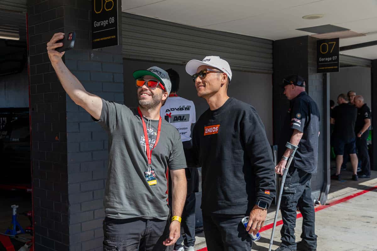 Dai poses for a selfie with a fan, 2024 World Time Attack Challenge