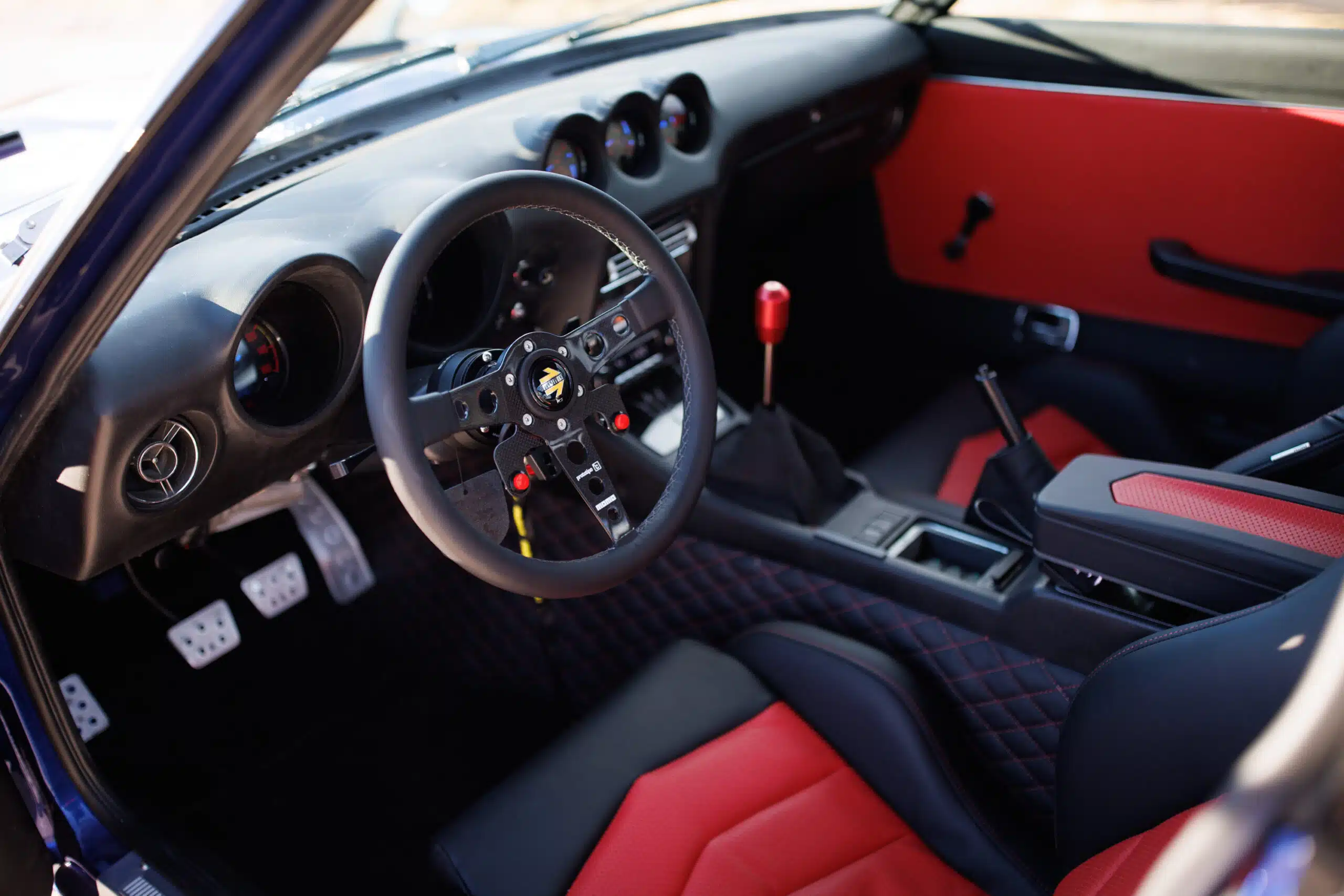 John Lau’s 1971 Datsun 240Z, MOMO steering wheel, 2024 SEMA Show